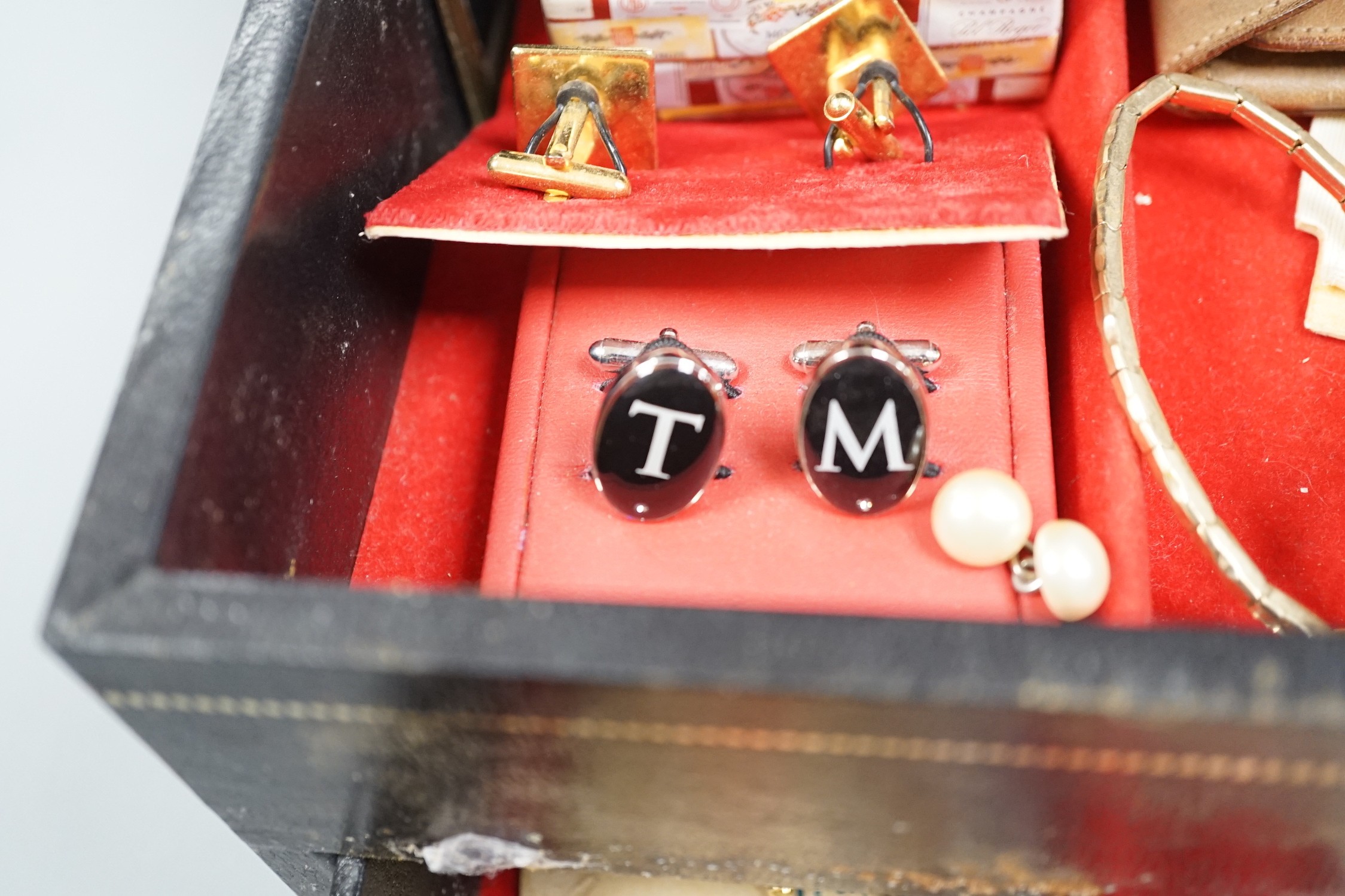 A group of assorted costume cufflinks, etc.